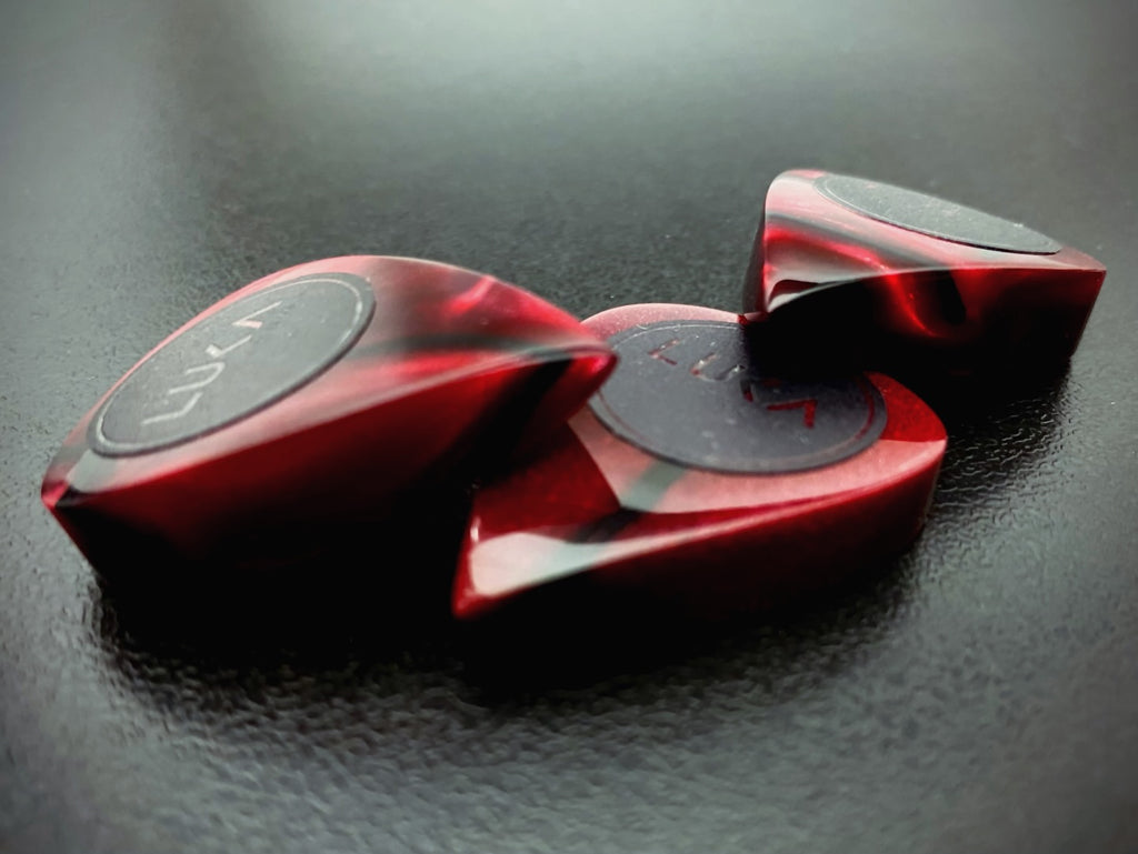 Handcrafted Kirinite Teardrop Guitar Plectrums - Custom Colorful Picks in Various Swirl Designs