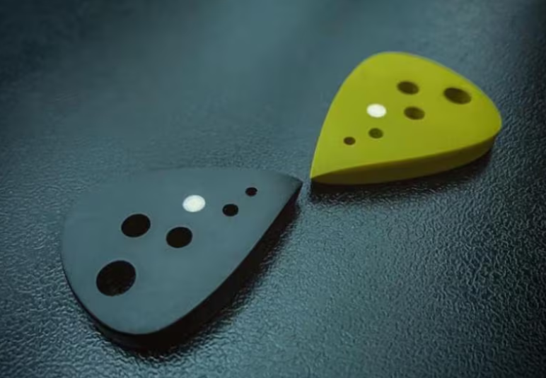 Modern Teardrop Guitar Pick – PEEK/Torlon, Drilled Holes, Glow-in-the-Dark