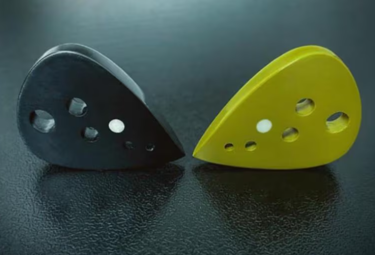 Modern Teardrop Guitar Pick – PEEK/Torlon, Drilled Holes, Glow-in-the-Dark