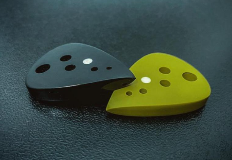 Modern Teardrop Guitar Pick – PEEK/Torlon, Drilled Holes, Glow-in-the-Dark