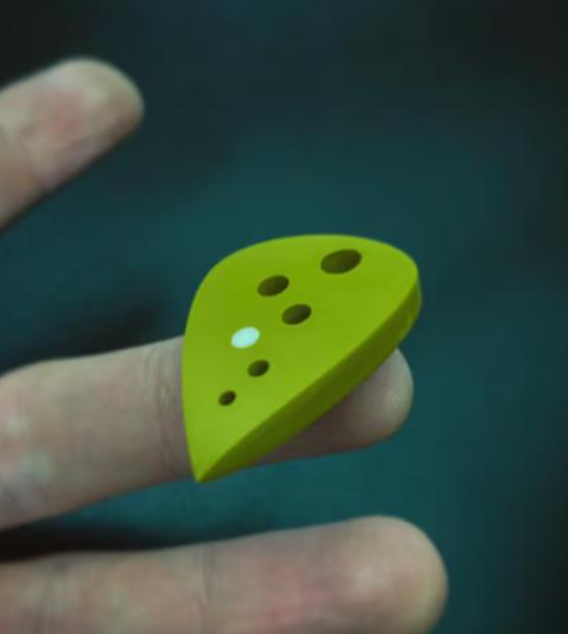 Modern Teardrop Guitar Pick – PEEK/Torlon, Drilled Holes, Glow-in-the-Dark