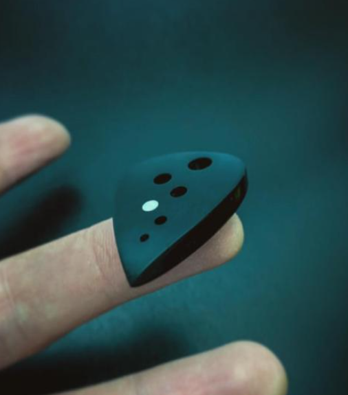 Modern Teardrop Guitar Pick – PEEK/Torlon, Drilled Holes, Glow-in-the-Dark