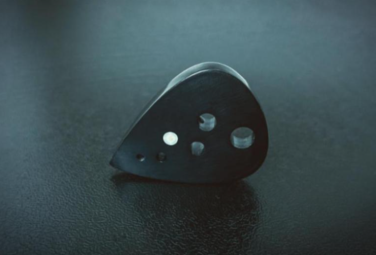 Modern Teardrop Guitar Pick – PEEK/Torlon, Drilled Holes, Glow-in-the-Dark