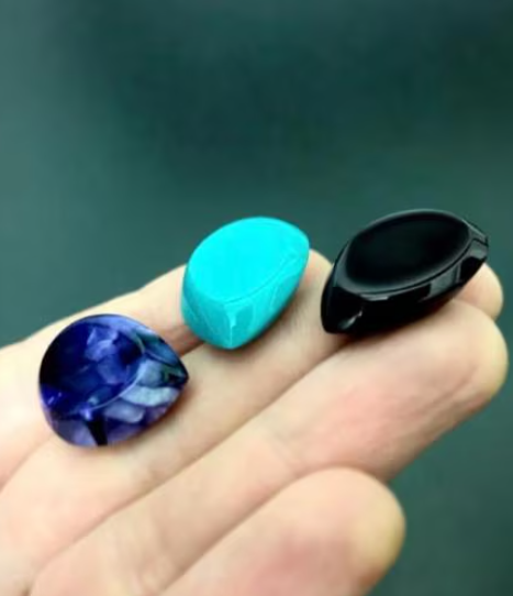 Artisanal Asymmetric Guitar Pick – Fully Hand-Shaped Kirinite Plectrum – Amethyst, Turquoise, Burgundy – 53 Colors And Patterns