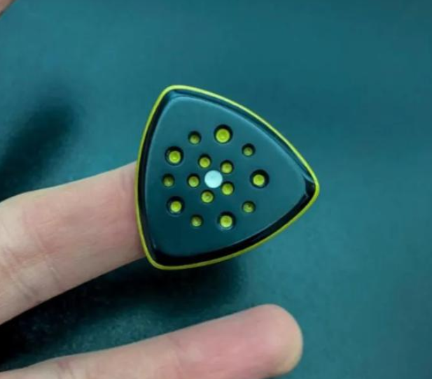 Modern Triangle Guitar Pick – Torlon, Peek, Glow-in-the-Dark Core